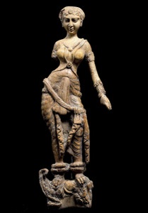 Cat. No. 148: Statuette of a woman standing on a makara, possibly a furniture ornament (Begram, Room 10), 1st-2nd centuries AD (ivory, 45.6 cm (17 15/16)) - National Museum of Afghanistan © Thierry Ollivier / Musée Guimet